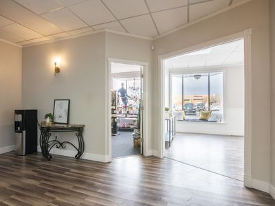 Main level front office with large windows to Union Square