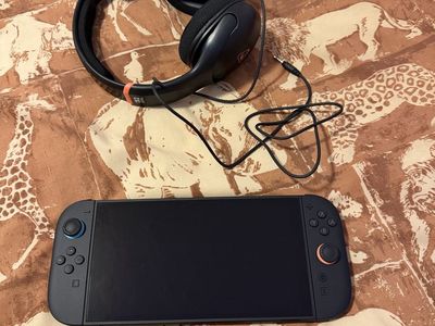 Nintendo Gaming Console Bundle with Dock, Controller Grips, and Headset