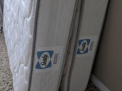 2 Sealy Twin mattresses
