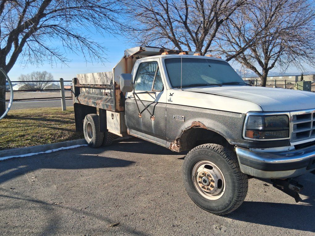 Ford F-350 Dually Dump Truck with Snowplow Attachment