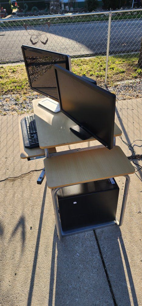 2 Hp Computer monitors and a Dell computer tower also a desk included. Pick Up only.