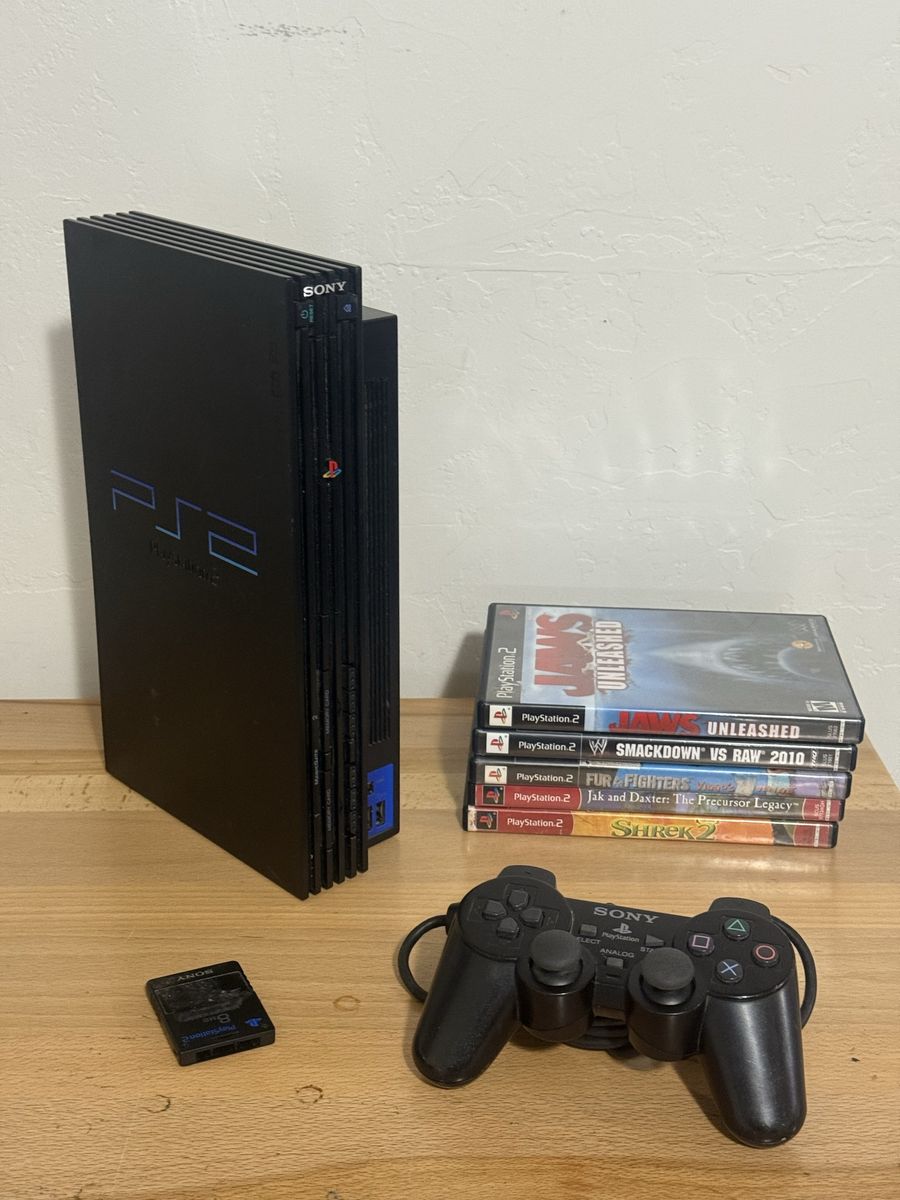 PlayStation 2 with one controller and 5 games