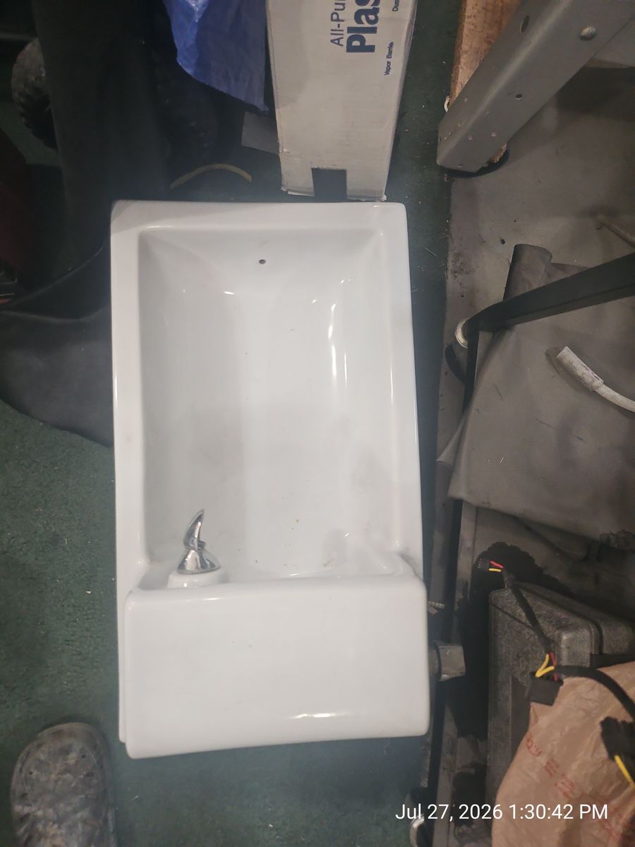 Used Kohler semi-recessed porcelain drinking fountain, model K-5293 or similar.