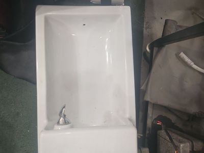 Used Kohler semi-recessed porcelain drinking fountain, model K-5293 or similar.