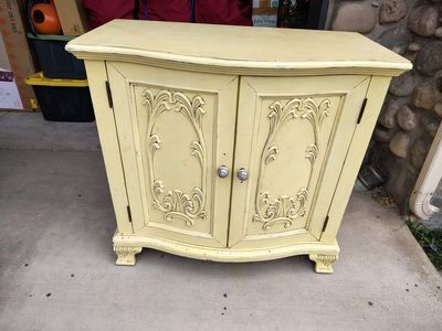 Vintage Yellow Painted Wooden Cabinet with Carved Accent Doors & Interior Shelf