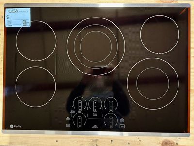 GE PROFILE 30 INCH COOKTOP WITH WARRANTY