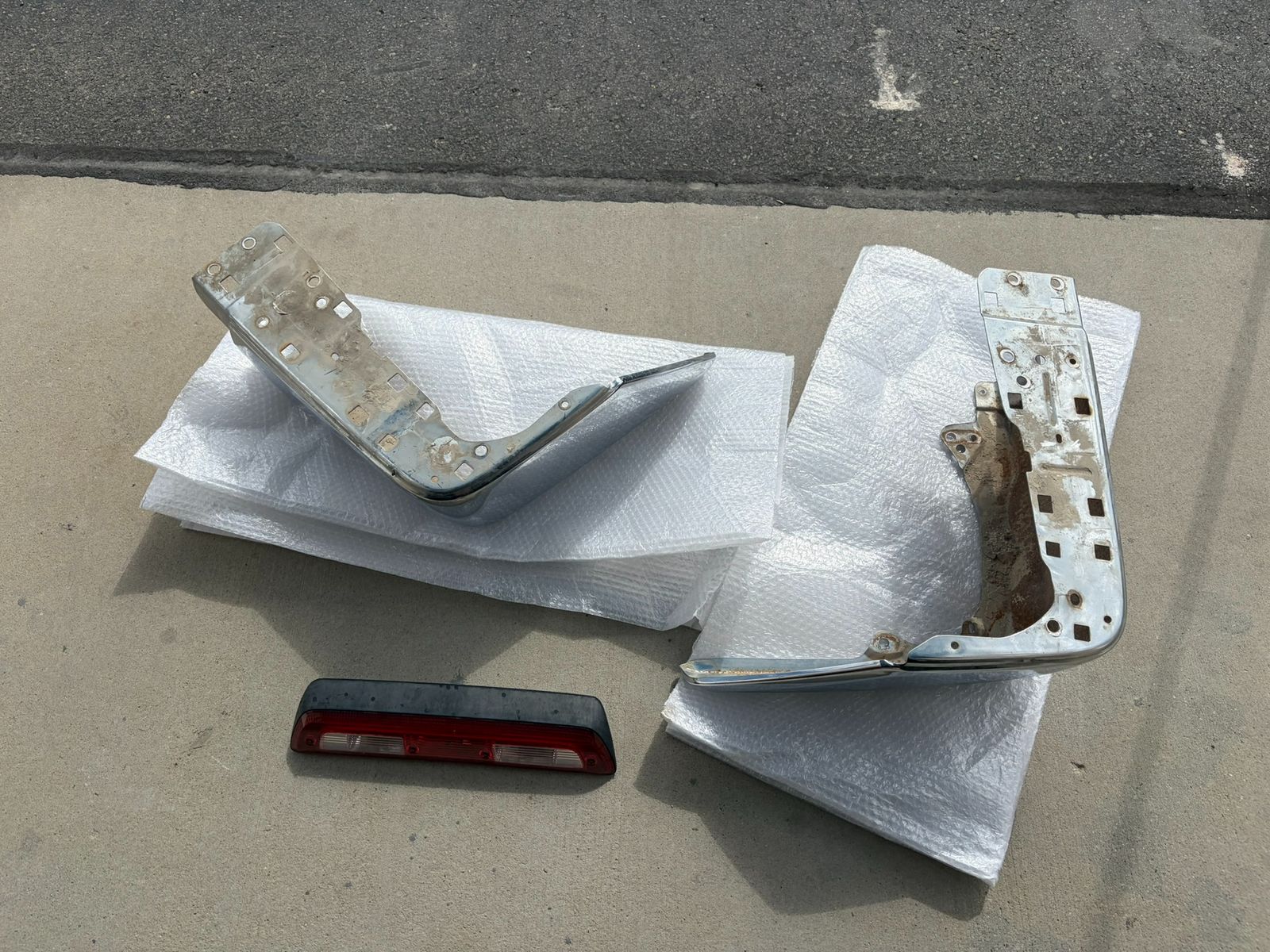 Tundra chrome rear bumper corners and high mount center brake light.