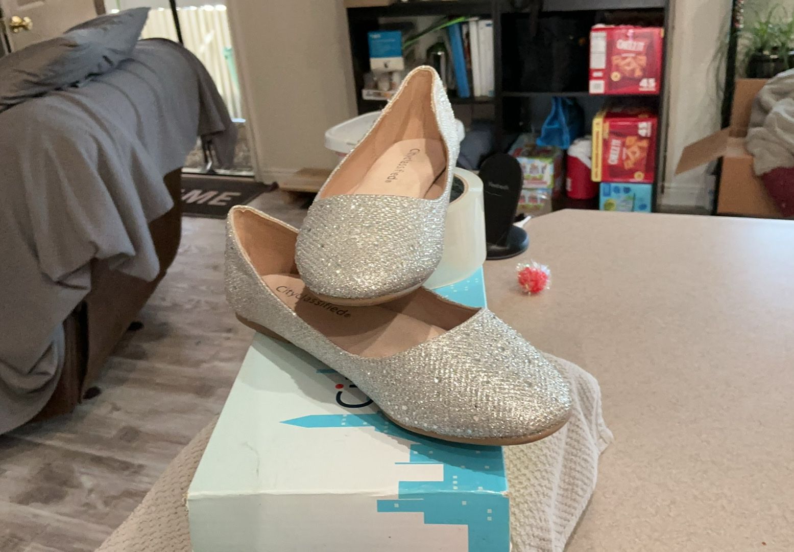 Women’s silver shimmer flats