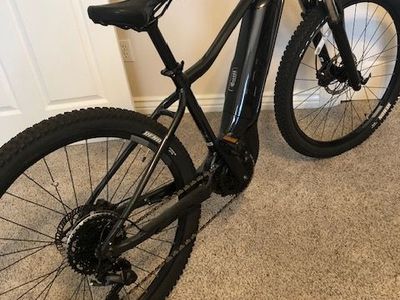 Giant E-bikes - 1 men's, 1 women's