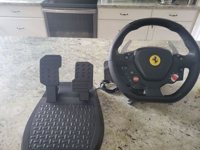 Thrustmaster Ferrari Racing Wheel and Pedals Set for Playstation