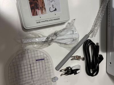 Bernina 570 QE Sewing Machine with Embroidery Module, BSR, and Accessories