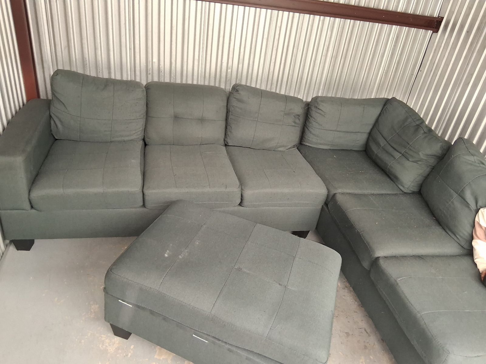 L shaped couch with Ottoman