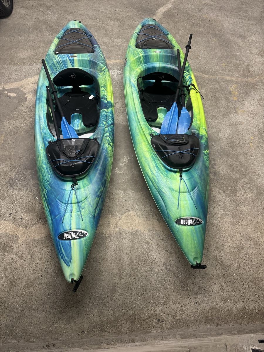 Pelican Sit-In Style Kayaks w/paddles