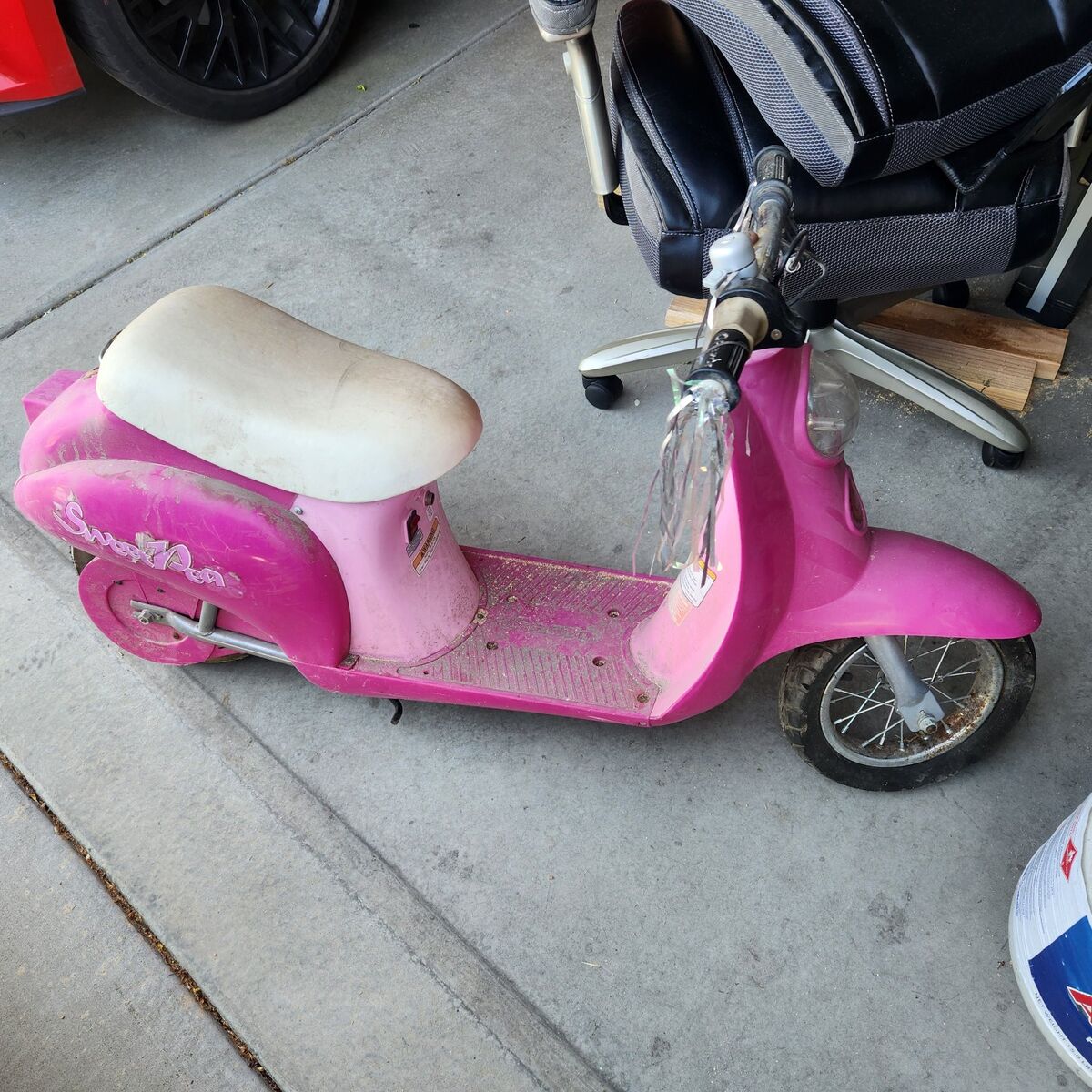 Pink electric sweet pea scooter needs some tlc