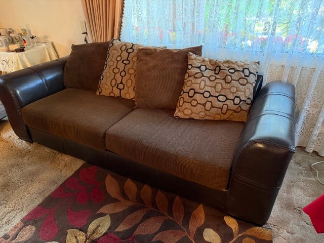 Sofa in Mint Condition!  Long enough to sleep on it!