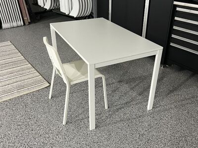White Plastic Table With Two Chairs