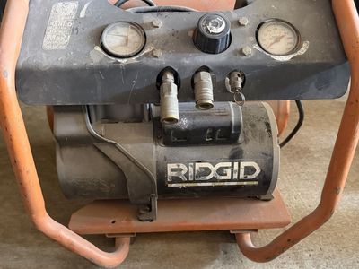 RIDGID 150 PSI Air Compressor - Twin Stack Tank Portable Worksite Compressor