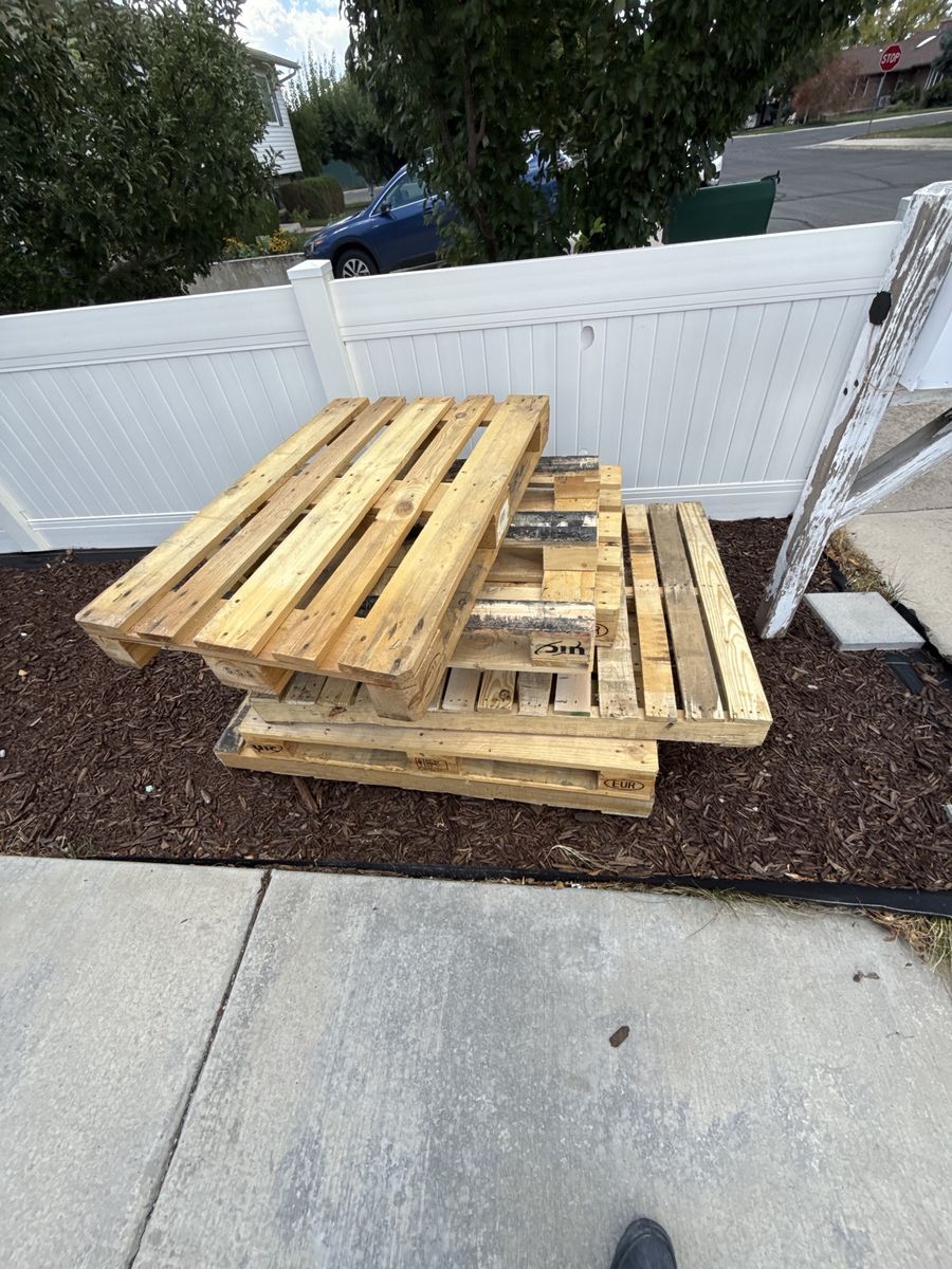 Wooden Pallets Stacked Outdoors