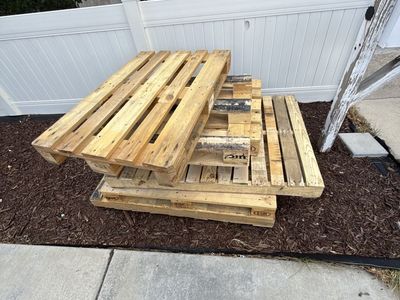 Wooden Pallets Stacked Outdoors