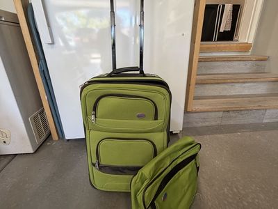 Green Rolling Luggage and Matching Shoulder Bag Set