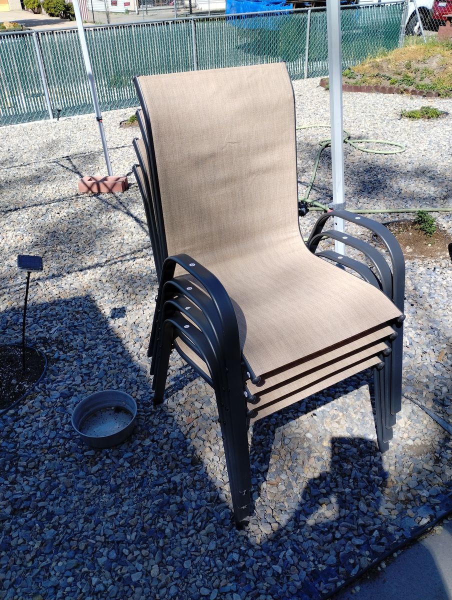 NEW PATIO CHAIRS SET OF 4 120$