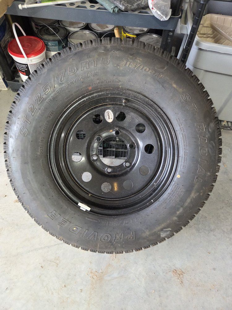 New spare trailer tire and wheel