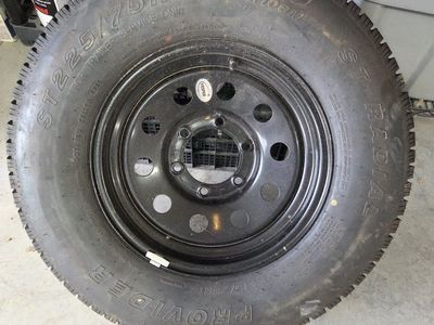 New spare trailer tire and wheel