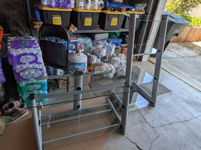 Glass Tv Stand and four shelf tier stand