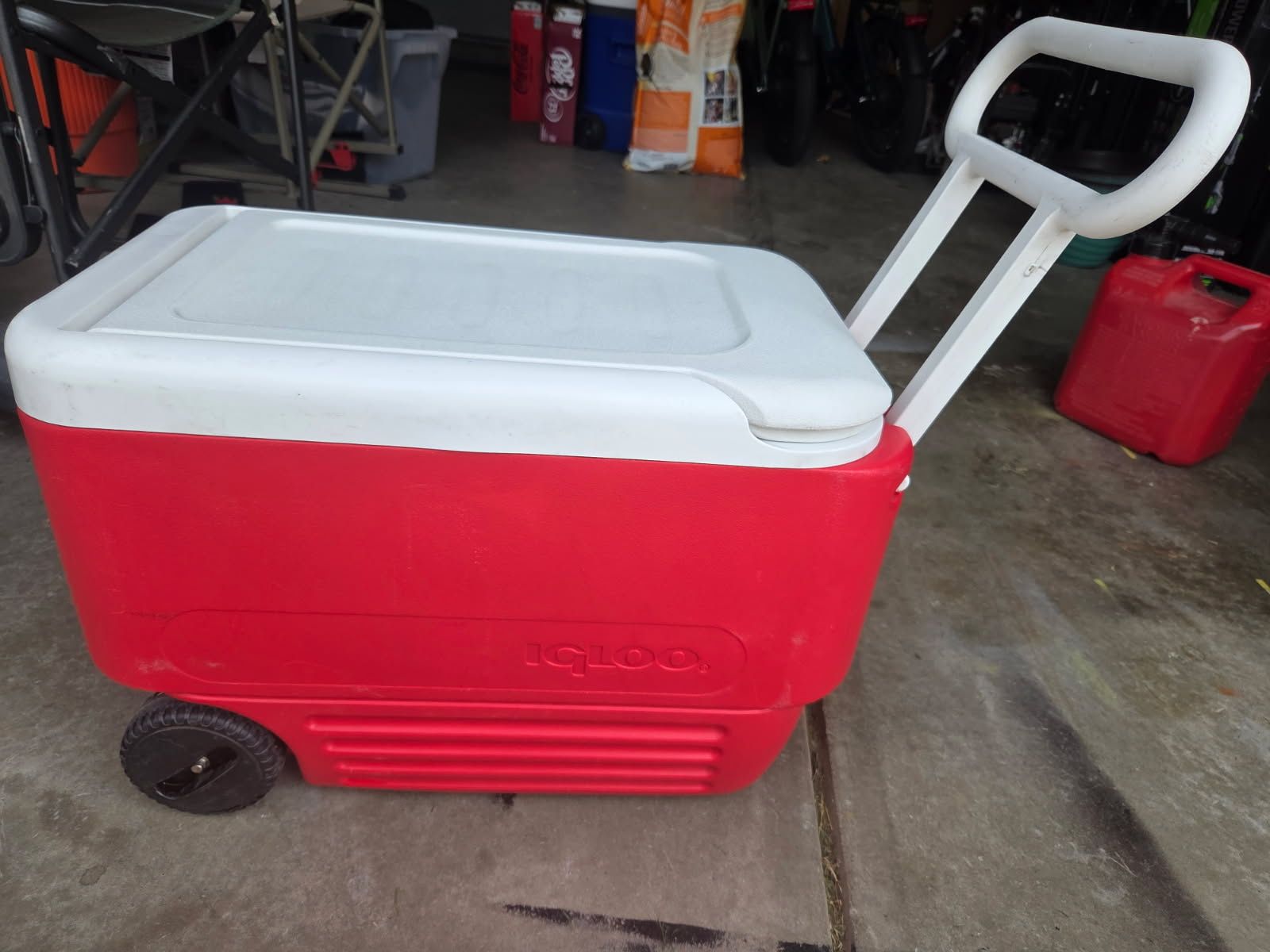 Igloo Red and White Wheeled Rolling Cooler with Tow Handle