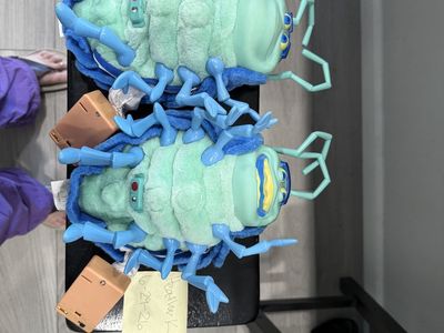 Vintage Thinkway Toys electronic plush dolls of Tuck and Roll from Disney Pixar's A Bug's Life.