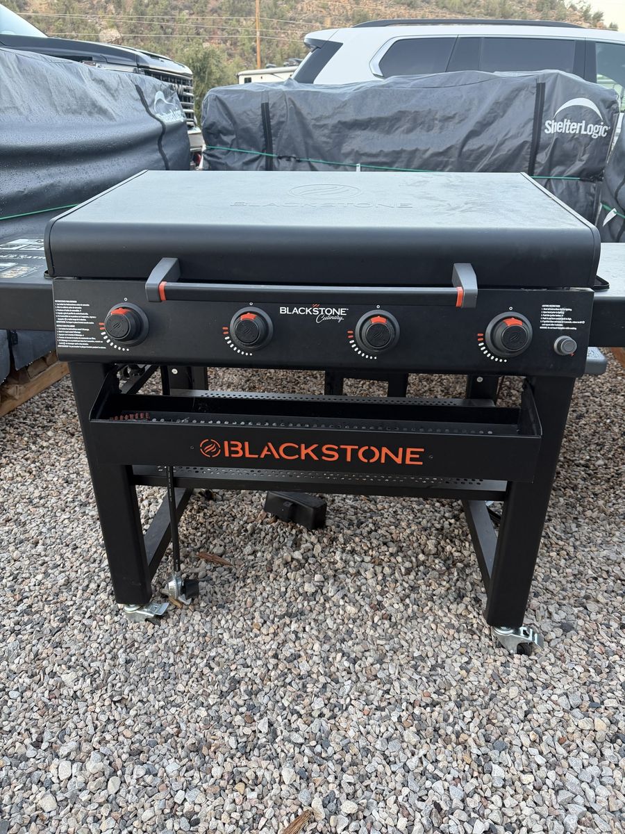 Blackstone Culinary 4-Burner Outdoor Gas Griddle with Hood and Front Caddy