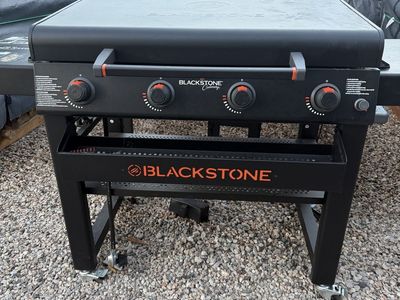 Blackstone Culinary 4-Burner Outdoor Gas Griddle with Hood and Front Caddy