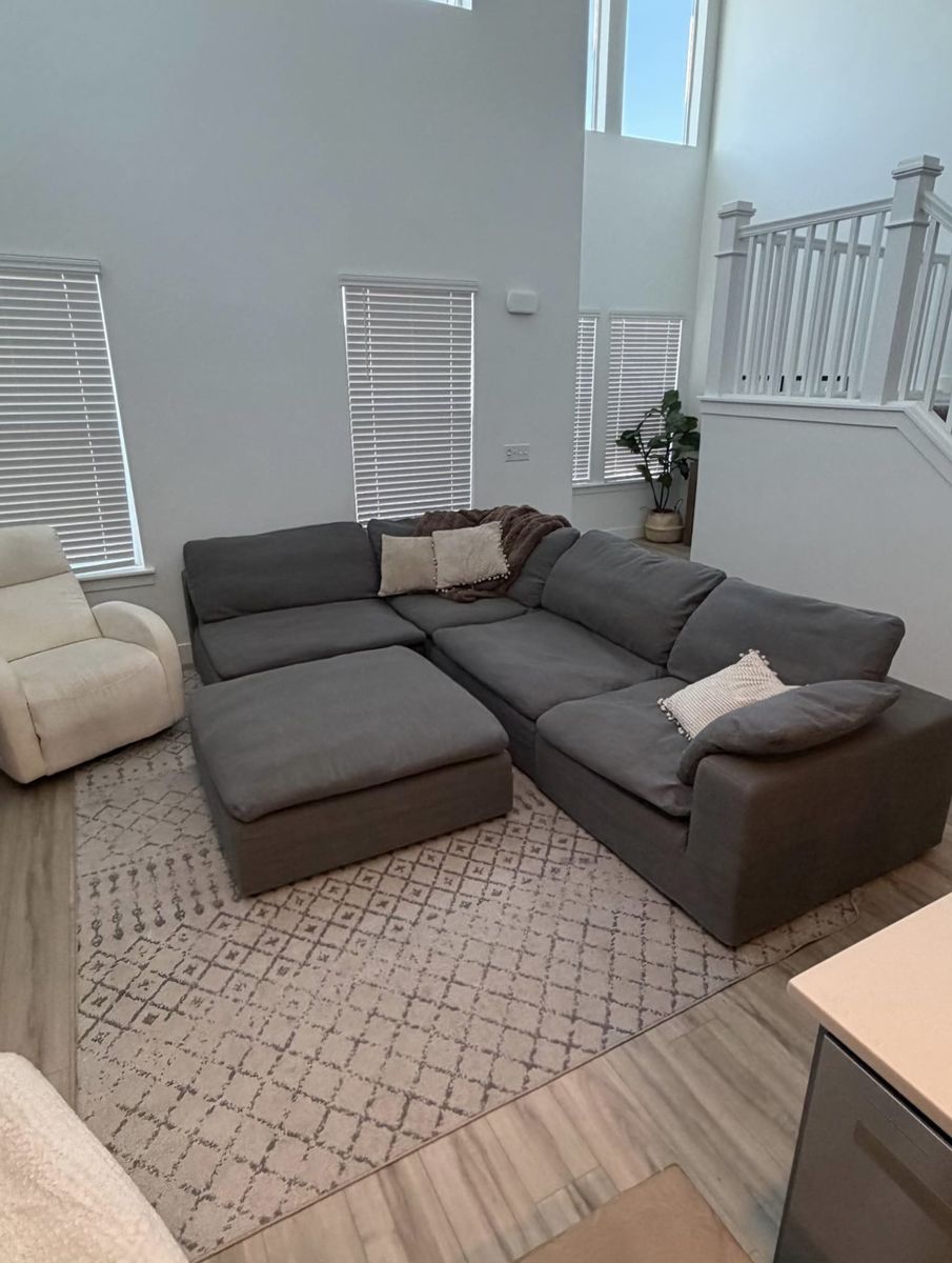 Spacious Grey Modular Sectional Sofa with Ottoman - Customizable Layout, Excellent Condition