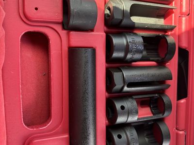 Brand new oxygen sensor socket set in case