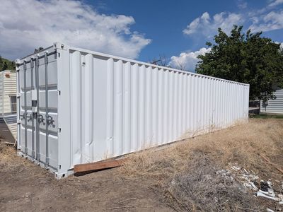 40' White Shipping Container with Electrical Outlet & Overhead Lighting