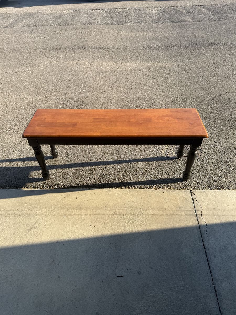Wooden Piano Bench with Dark Turned Legs and Warm Stained Wood Top
