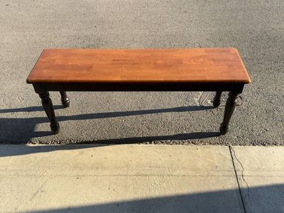 Wooden Piano Bench with Dark Turned Legs and Warm Stained Wood Top