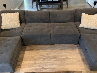 Sectional couch with storage ottoman