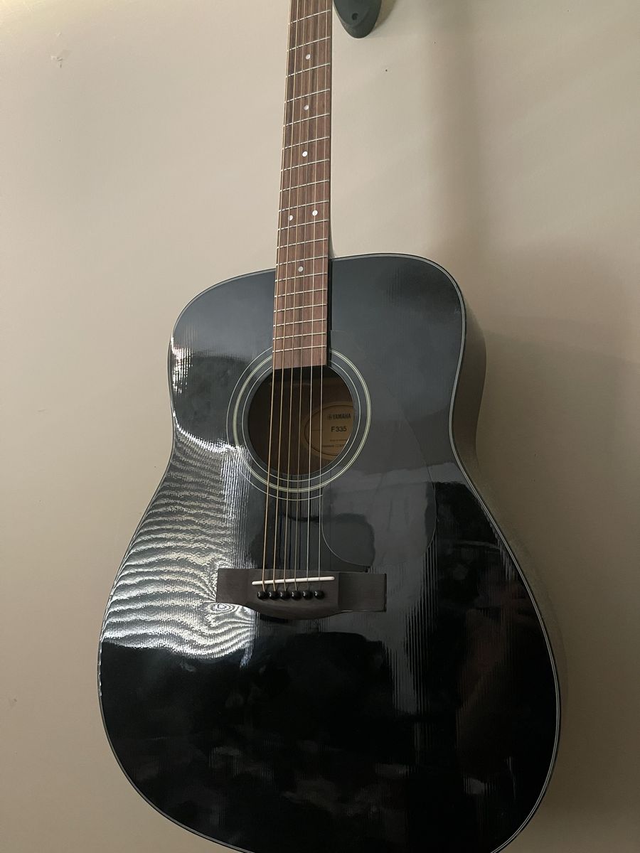 $100 Acoustic Yamaha Guitar