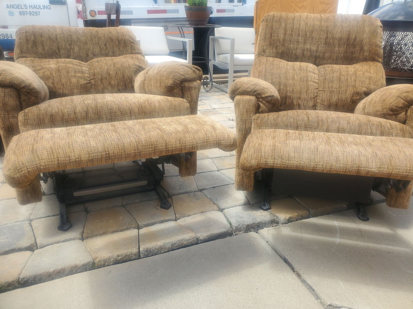 Pair of Tan Fabric Recliner Chairs - Comfortable and Functional Living Room Seating