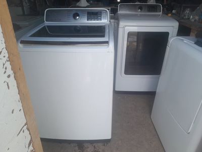Beautiful Samsung Top Load Washer and Electric Dryer