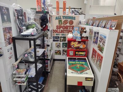 Sports Cards and Memorabilia Shop Owner Absentee