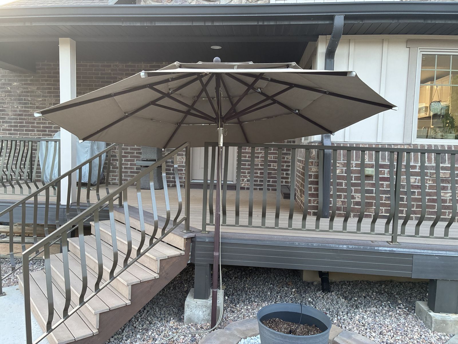 Patio umbrella with vents.