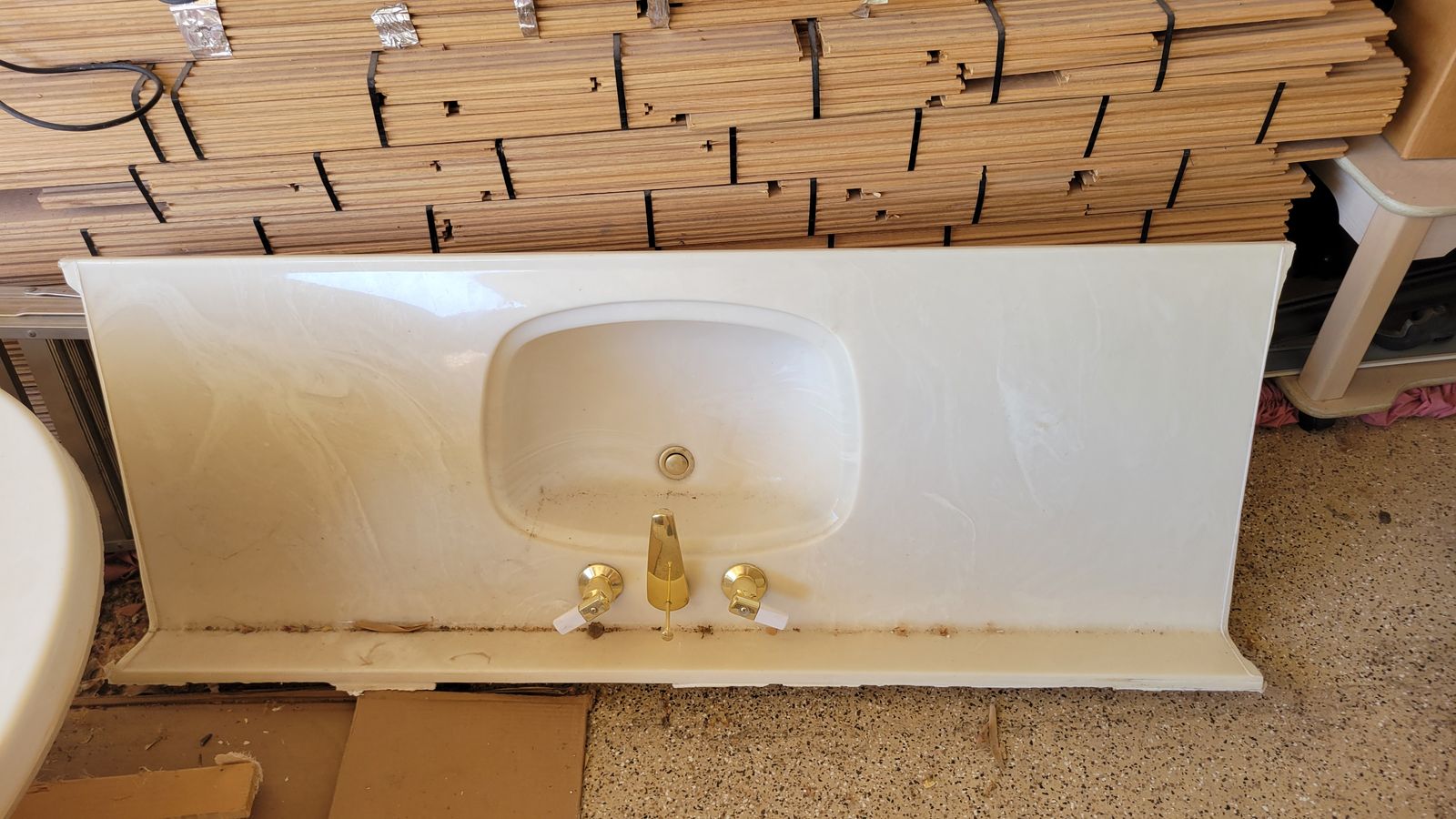 White Cultured Marble Bathroom Vanity Top with Integrated Sink and Gold Faucet
