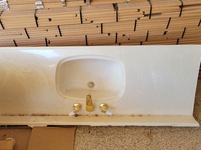 White Cultured Marble Bathroom Vanity Top with Integrated Sink and Gold Faucet