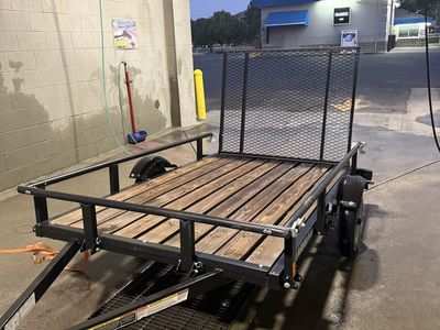 Karavan Utility Trailer with Wood Deck and Ramp. ( 5’ X 8’ )