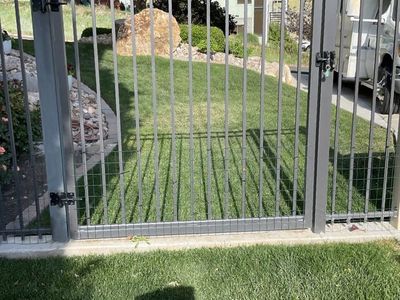 Brand new gate with all hanging and locking hardware. 65”wide X 73”high.