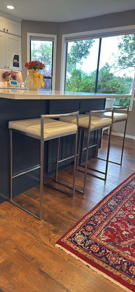 Set of 8 Modern Stainless Steel Bar Stools with Cream Upholstered Seats