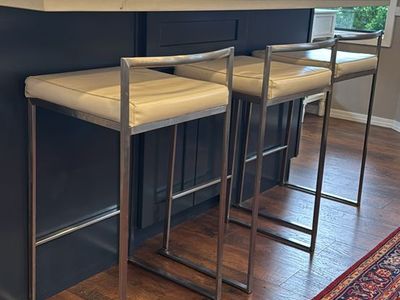 Set of 8 Modern Stainless Steel Bar Stools with Cream Upholstered Seats