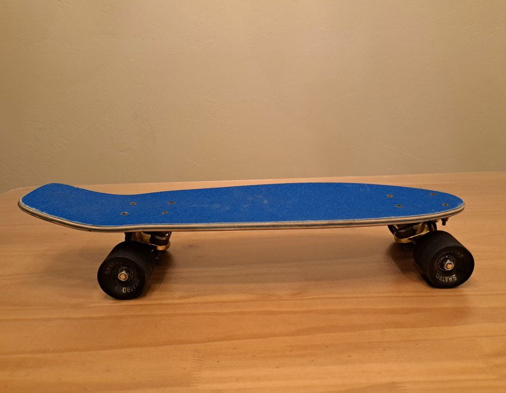 vintage Penny board with Gold Trucks